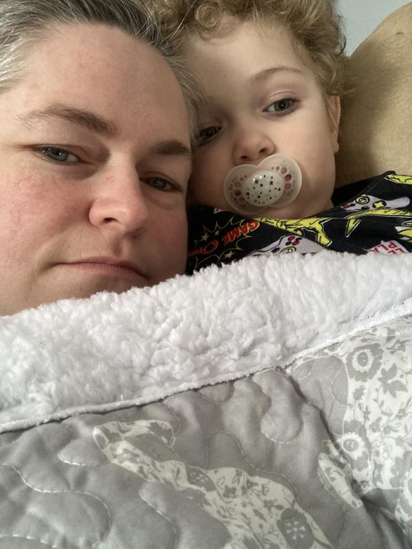 He really loves the new blanket