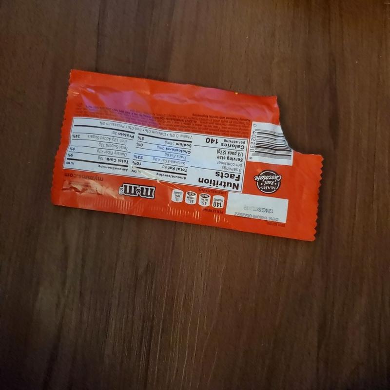This packet of Peanut Butter M&Ms has only red, orange, and brown