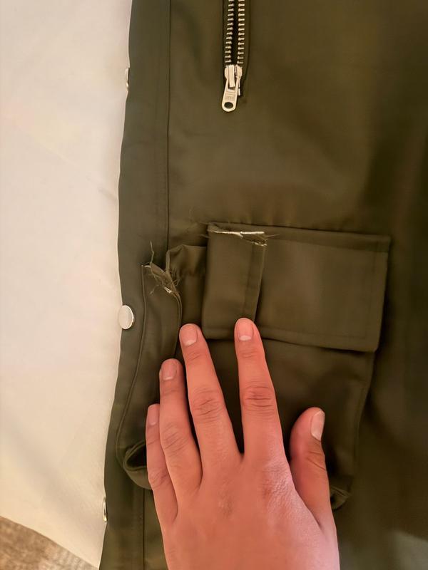 Customer photo for "Rips on first wear"