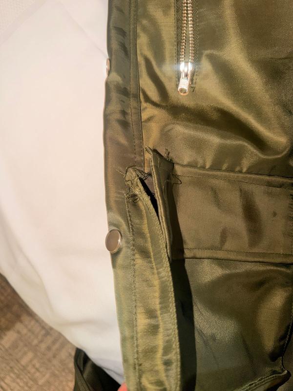 Customer photo for "Rips on first wear"