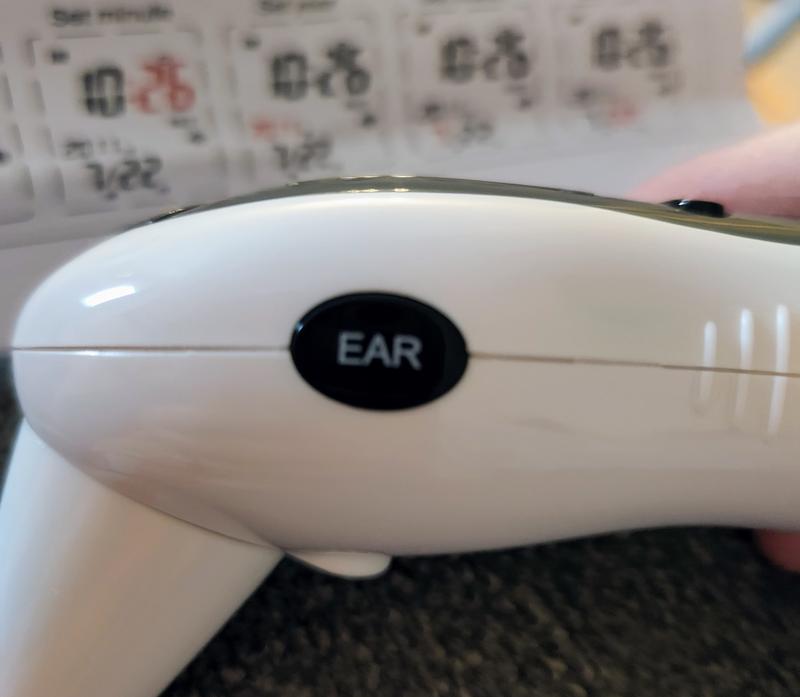 Ear button on side for ear probe reading