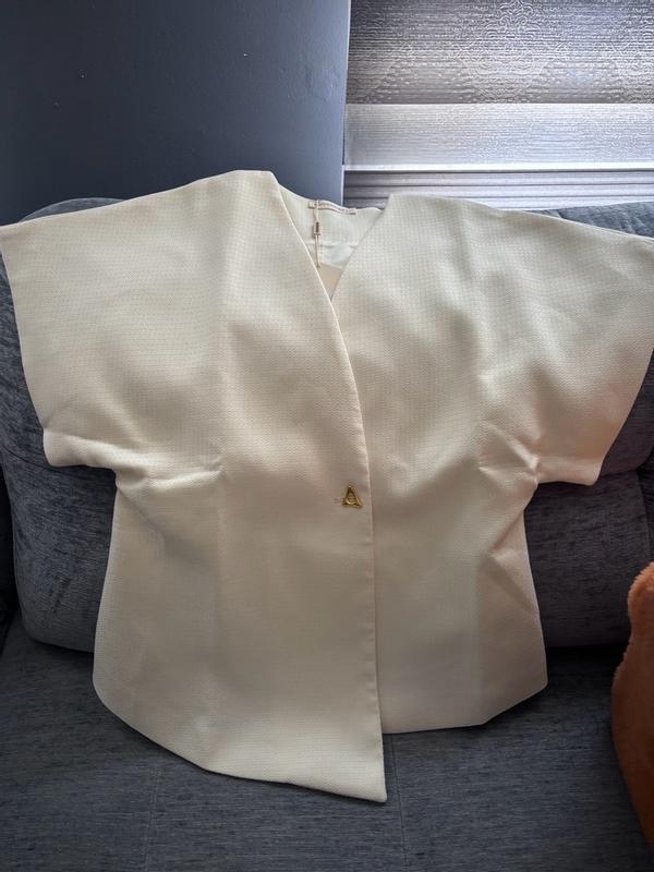 Customer photo for "Cute, comfortable, and stylish with a unique asymmetric hem.”"