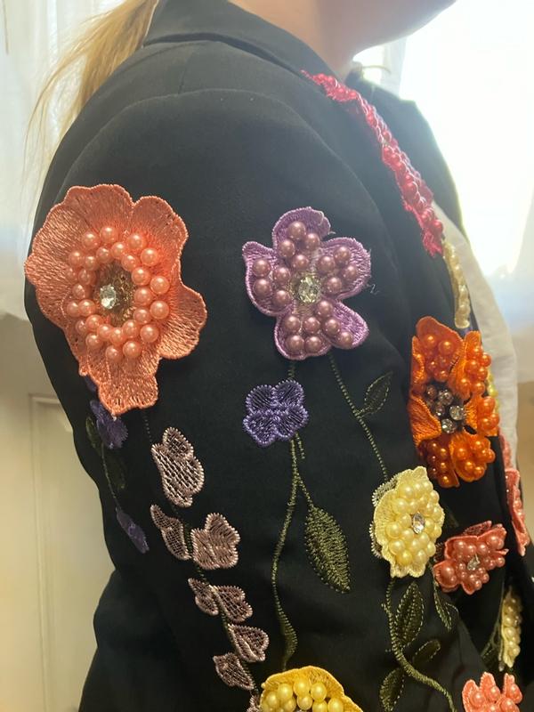 Customer photo for "Appliqués will fold"