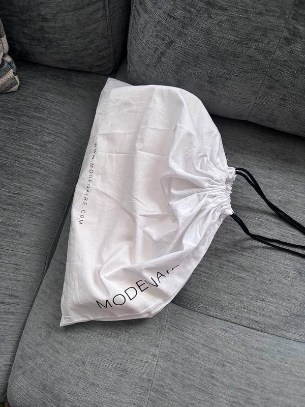 Customer photo for "Cute, comfortable, and stylish with a unique asymmetric hem.”"