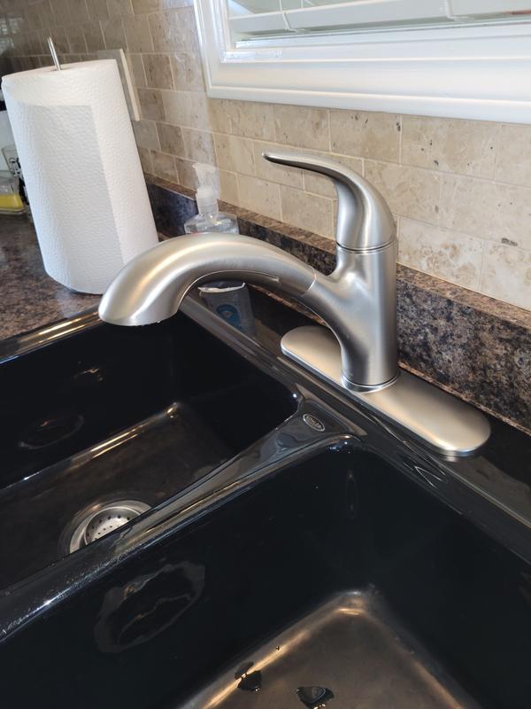 Stainless steel matches appliances and cabinet handles.