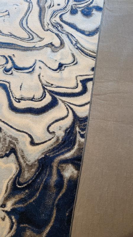 Grips and holds the rug really well