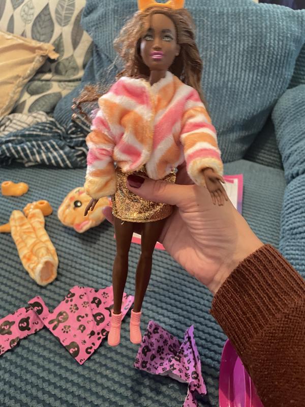 Doll with reversible cat jacket