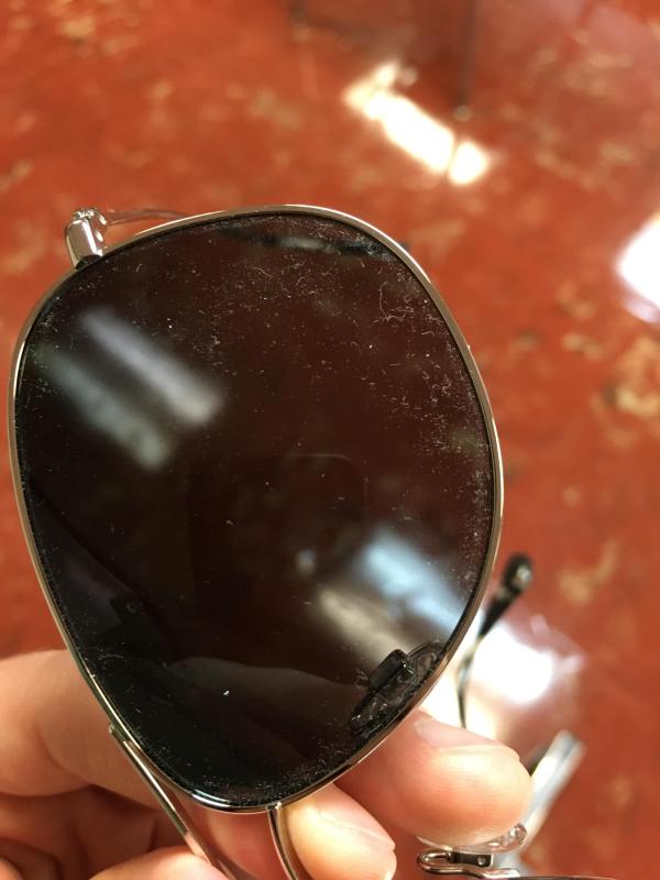 There is dust all over the lens after pulling it out of a microfiber bag.