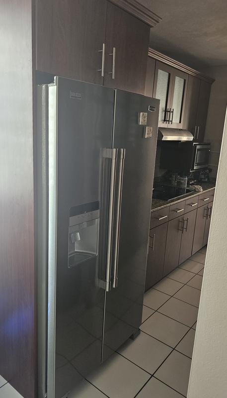 36-Inch Wide Side-by-Side Refrigerator with Exterior Ice and Water