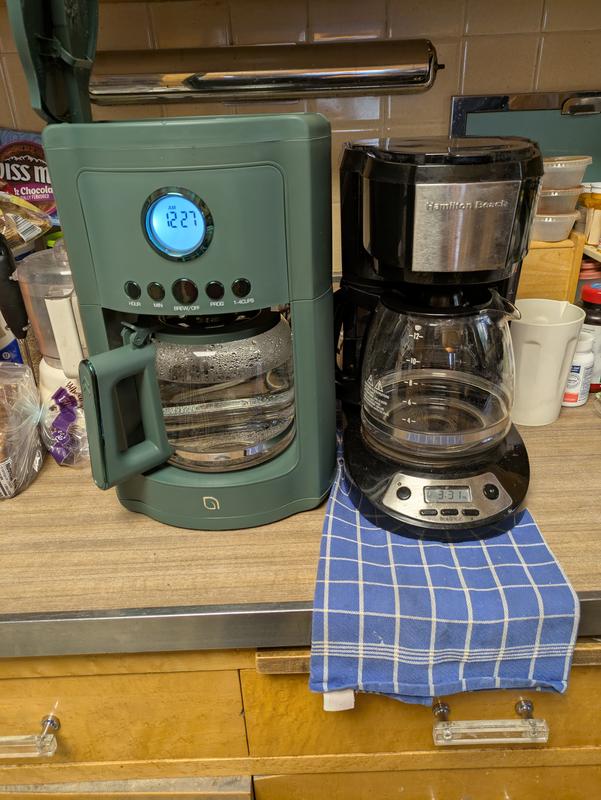 My current coffeemaker on right, the reviewed on one the left.  The green one is much larger but the cup capacity is the same.