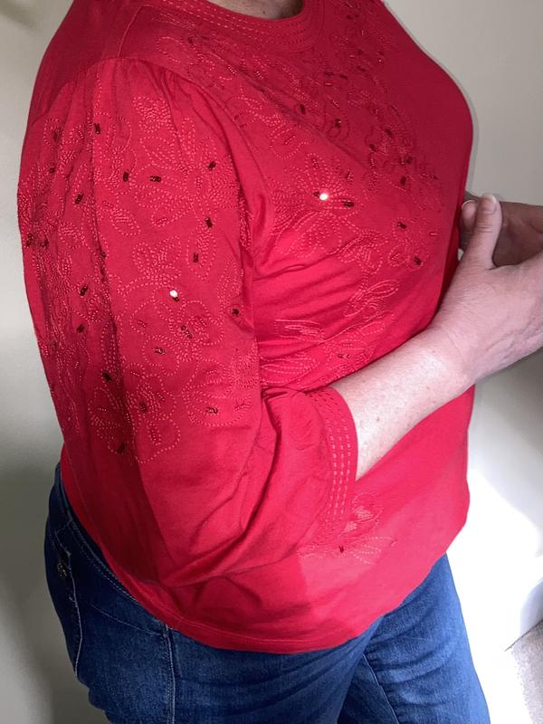 Sequins down left sleeve