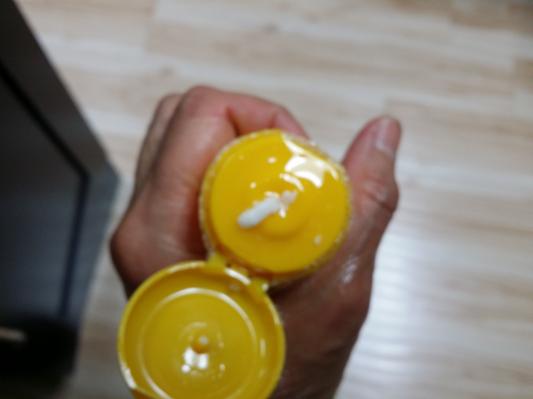 oil woozing out of the tube