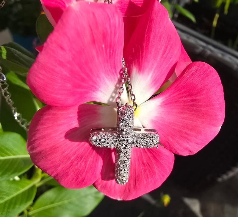 Cross pendant in the sun