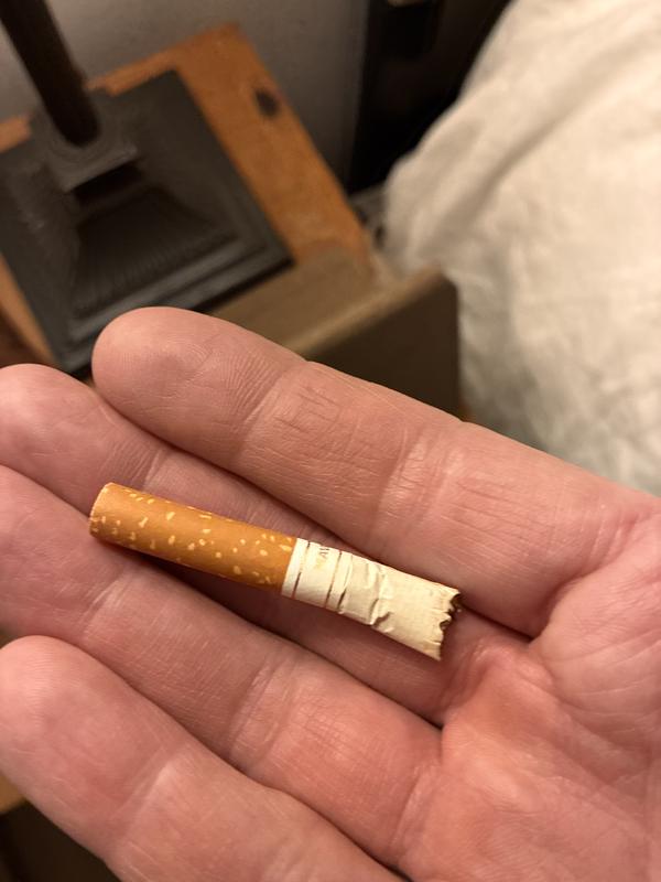 Used cigarette found in front pocket