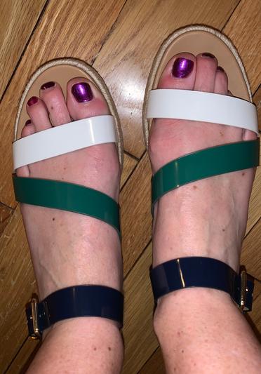 Looking down at sandals on my feet