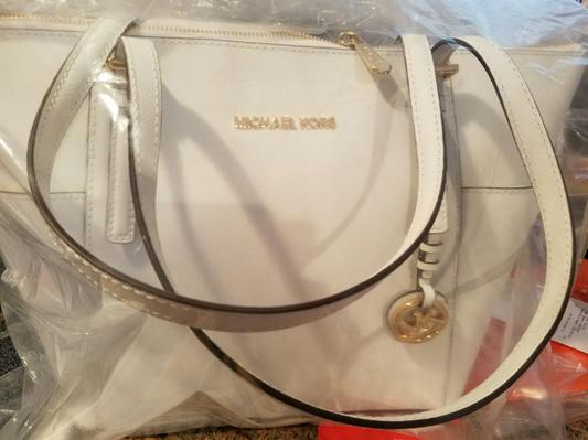 clear bag, no wrapped handles or hardware