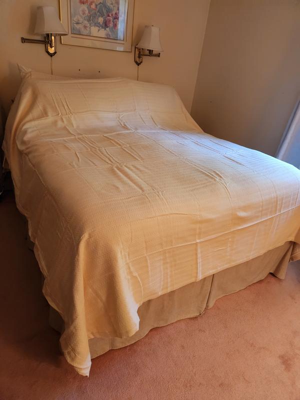 On queen bed. Note I did not iron yet