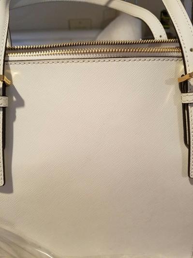 dirty/sticky discolored spots on back