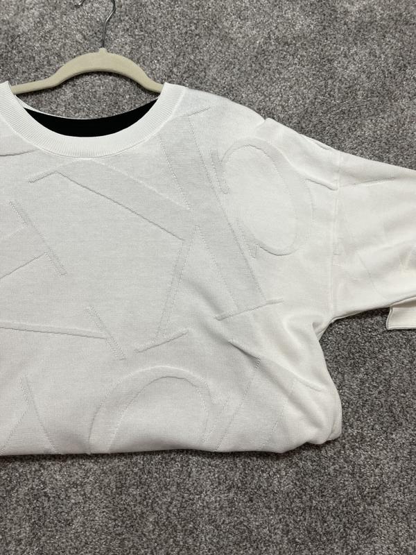 Note black tank under sweater, you can see color under sweater.