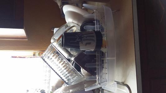 If I wasn't so excited to wash dishes all the time because of my new rack I'd be able to show you the real holding capacity of this little baby! :)