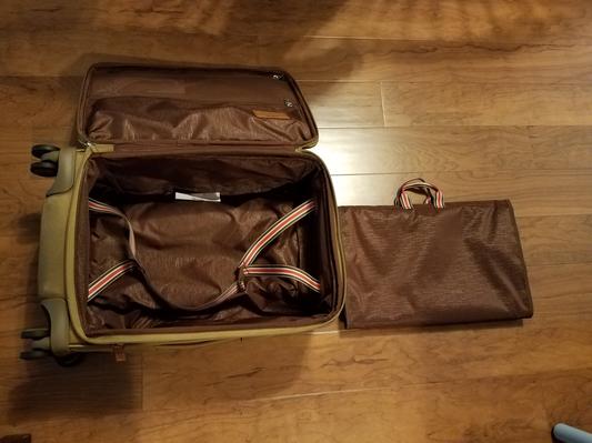 Garment bag folded to fit bottom