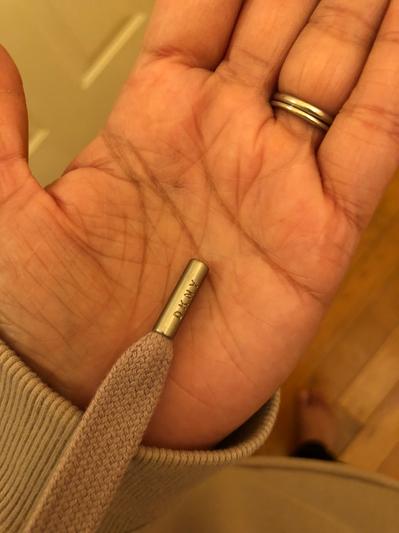 Metal capped drawstrings