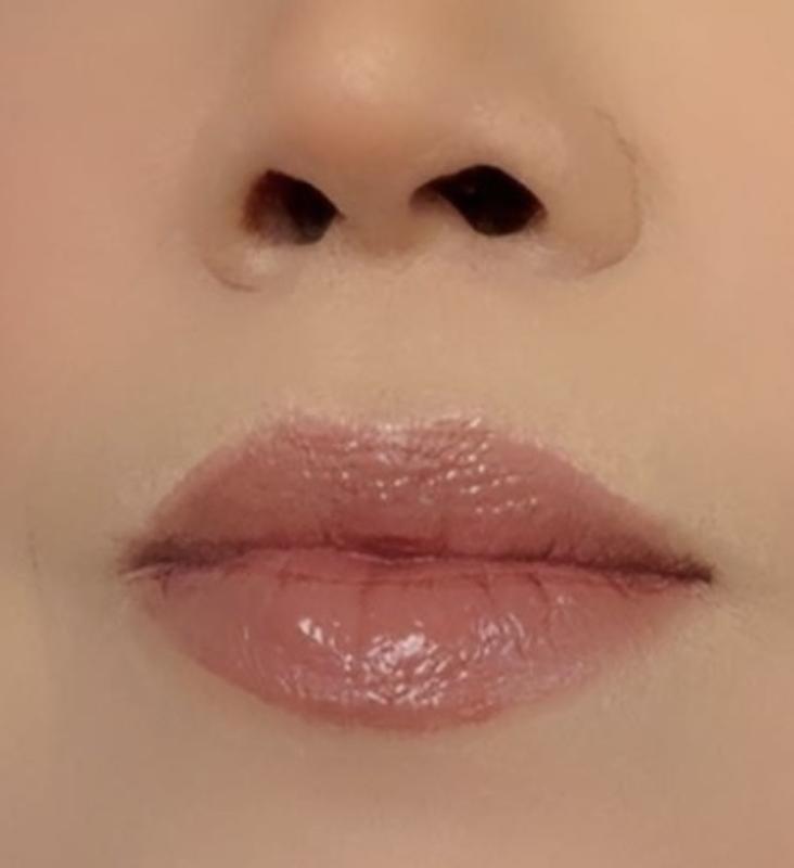 This is tarte maracuja lip oil (rose )