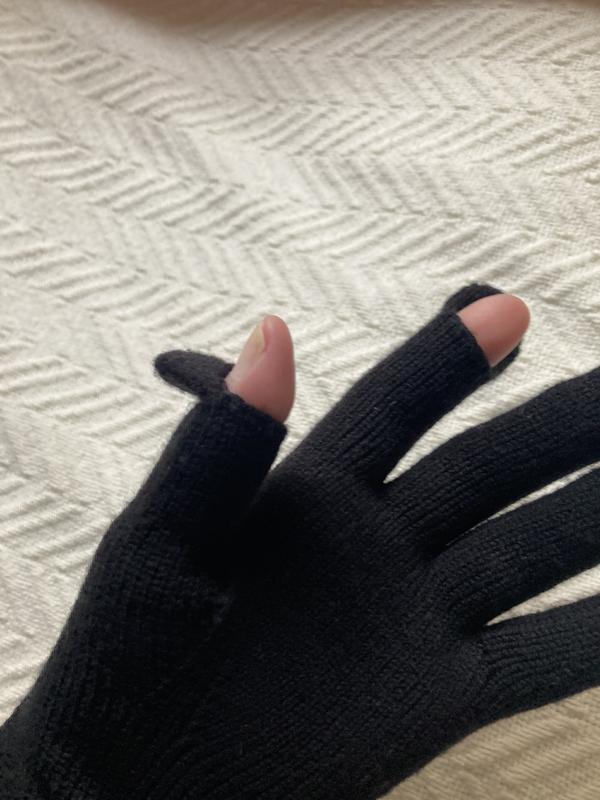 Stitched finger openings.