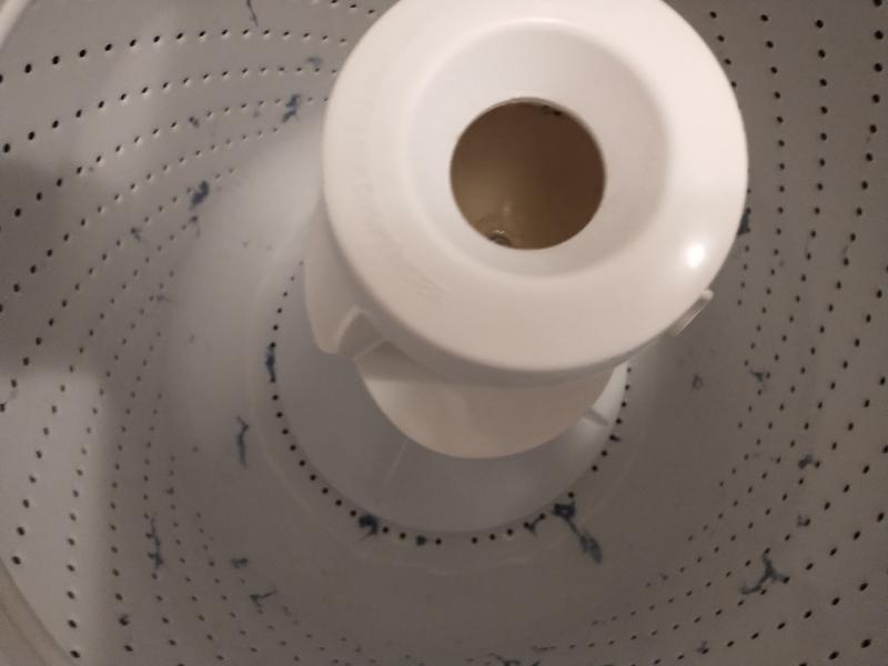 Washer, dryer trap ,floor after shaking towels for dryer. Materials everywhere.