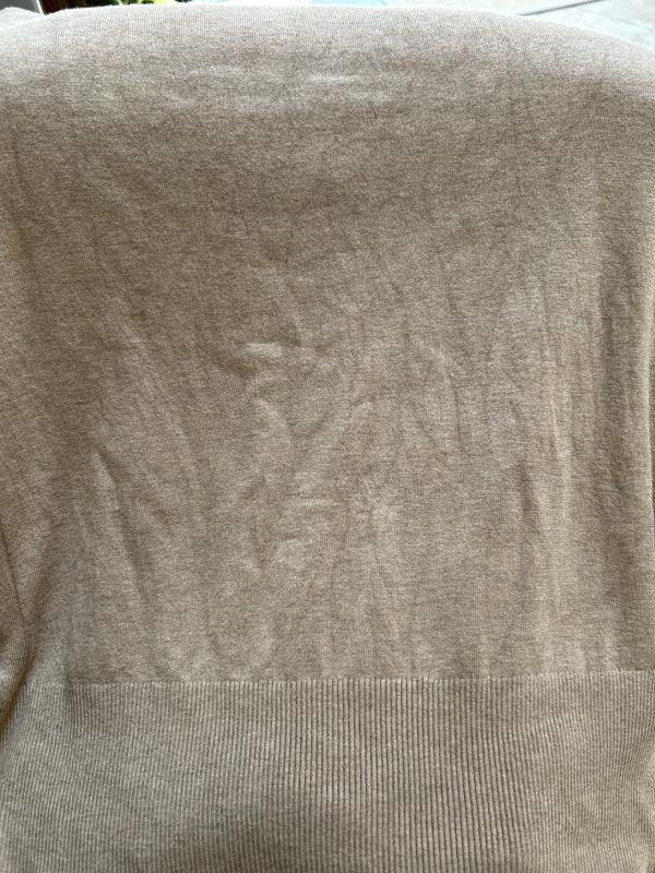 Back. Vertical squiggly lines. They are not wrinkles. This was after ironing.