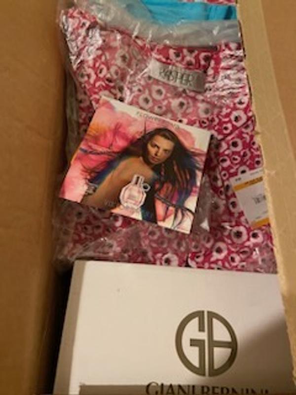 Perfume sample cards added to online order of clothes - stinky fragrance transferred to clothing!