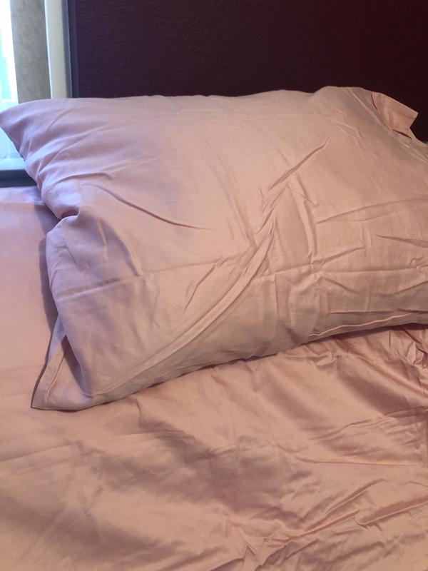 In darker bedroom