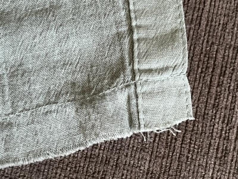 Picture of the blouse bottom that was not hemmed.