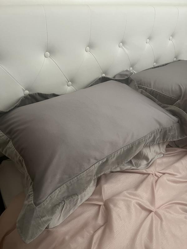 Shown inside the sham on my bed; it is smooth and soft.