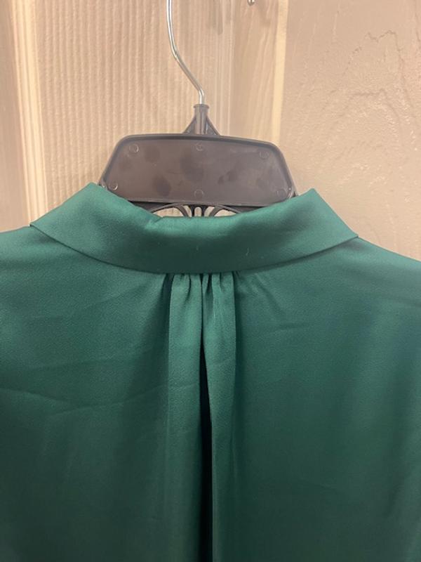 I like how it's gathered here rather than mid back.