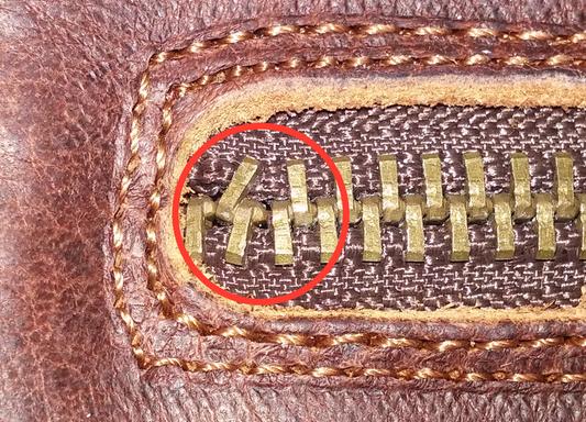 broken, maligned zipper