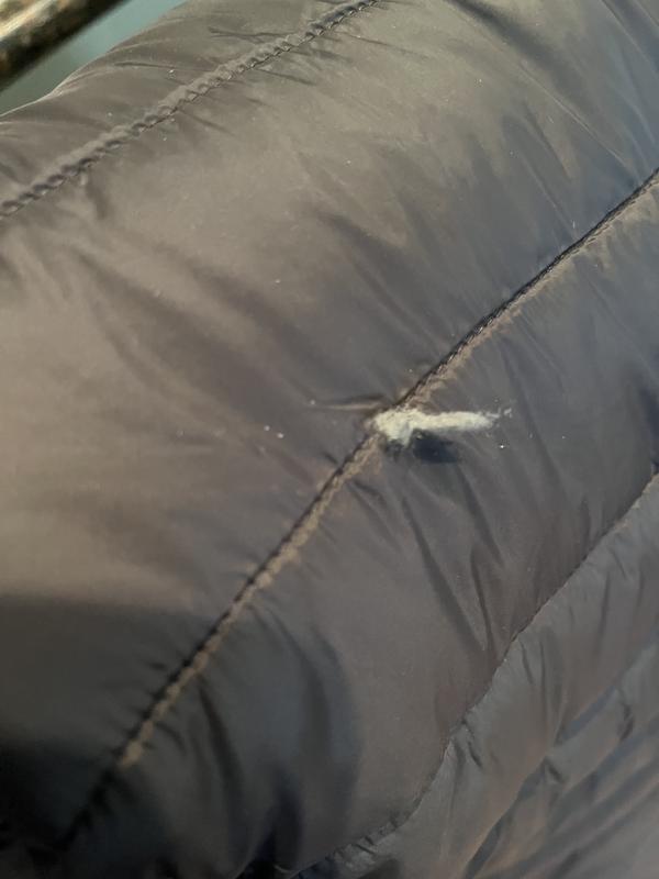 Insulation coming out of a tear in the sleeve