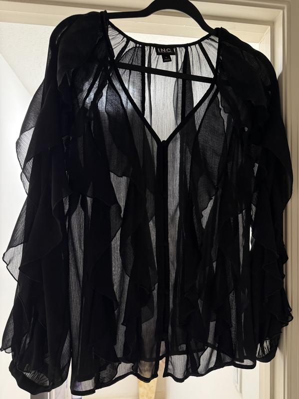This picture shows how sheer the shirt is.