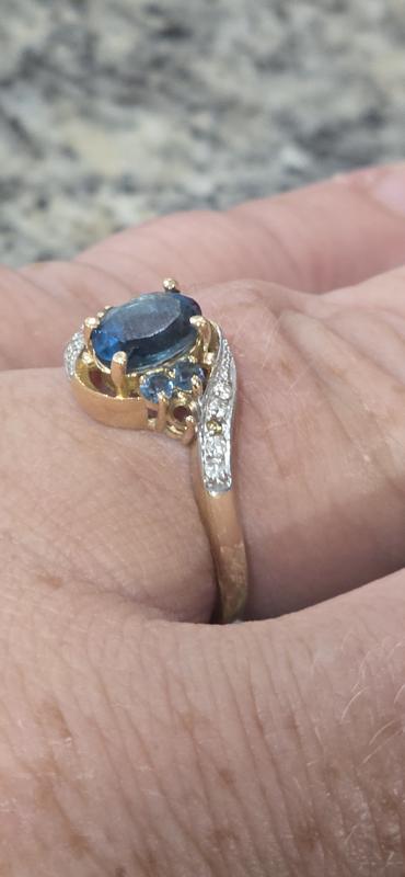 2 stones missing. 1 blue stone and 1 diamond