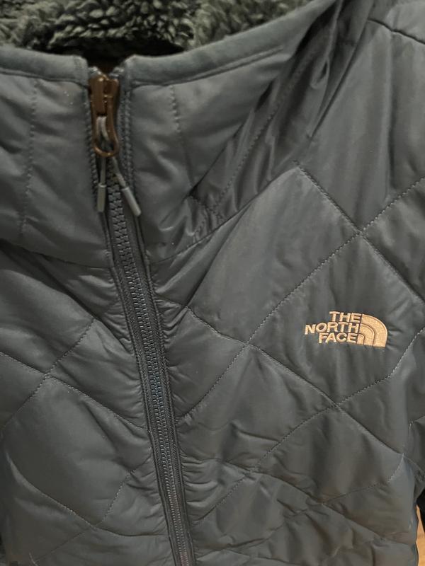 No breast pocket on inside or outside