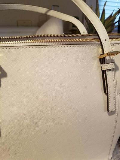 dirty/sticky discolored spots on back