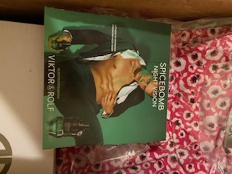 Cologne sample cards added to online purchase of clothing - entire box stinks!