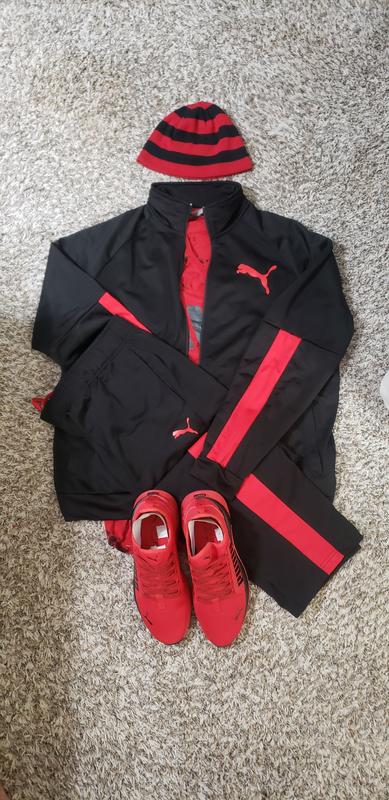 The Cap is generic and Shirt is Macy's Inc clothing line.