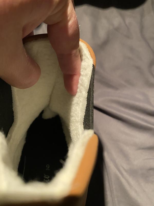 Extra material in boot irritates my foot