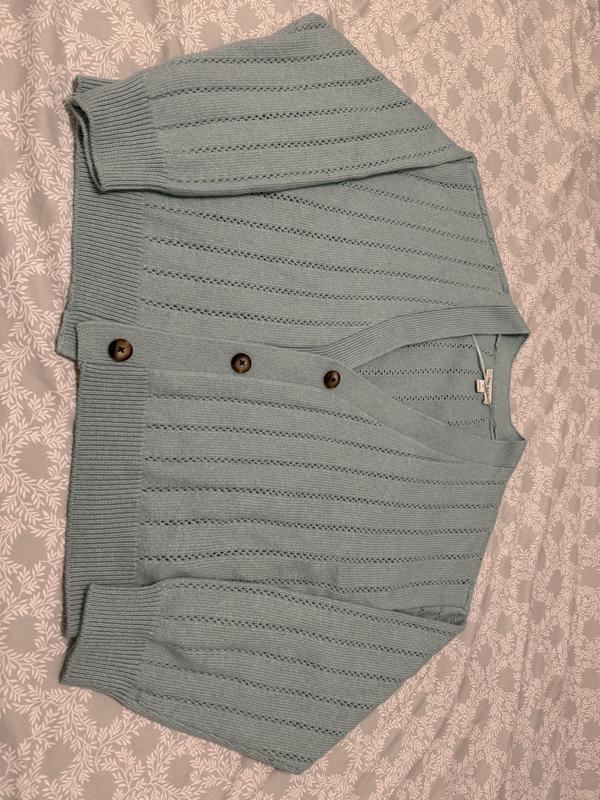 View with arms folded