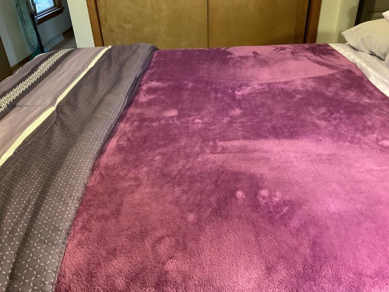Comforter is tru purple but blanket more of a rose, but I liked blanket for the price and tucks in well.