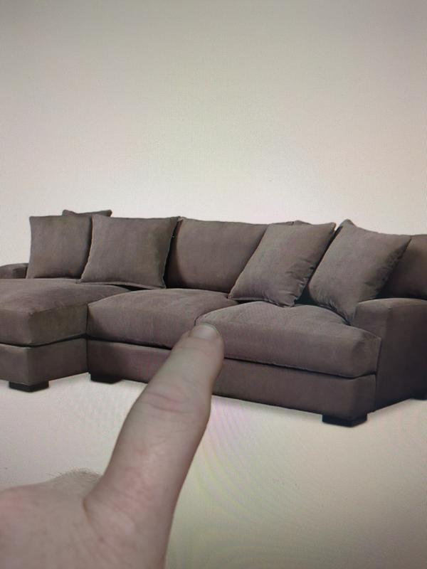 Can't tell here but once you sit there, the cushions push away from each other and you sink into a hole . Or if you lay your body gets swallowed. Most annoying thing ever