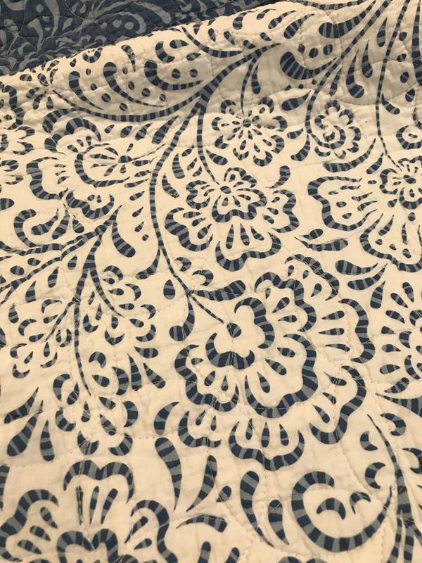 The white side of the quilt still looks great