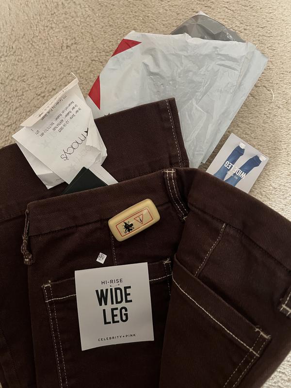 Jeans came with security sensor! Packing staff needs to be more diligent.