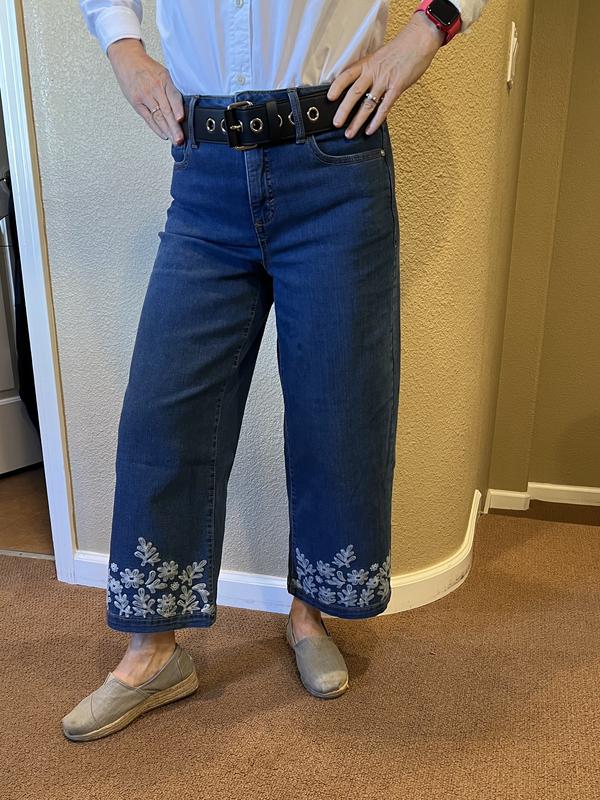 Fitted through the waist and hips with wide but straight legs.